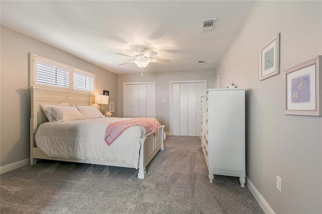 228 Marlin Dr, Slidell, LA 70461 - carpeted bedroom featuring multiple closets, ceiling fan, and baseboards