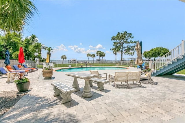 228 Marlin Dr, Slidell, LA 70461 - view of swimming pool featuring a patio area, a fenced backyard, and stairs