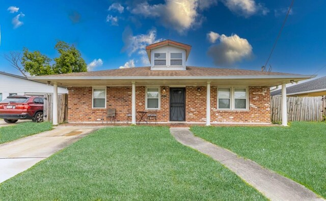 4624 Wright Rd, New Orleans, LA 70128 - view of front of home featuring brick siding, a porch, and a shingled roof
