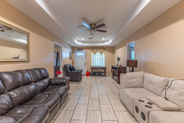 4624 Wright Rd, New Orleans, LA 70128 - living area featuring ceiling fan and a raised ceiling