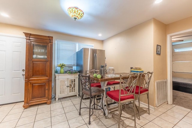 4624 Wright Rd, New Orleans, LA 70128 - dining room with light tile patterned floors, recessed lighting, and baseboards