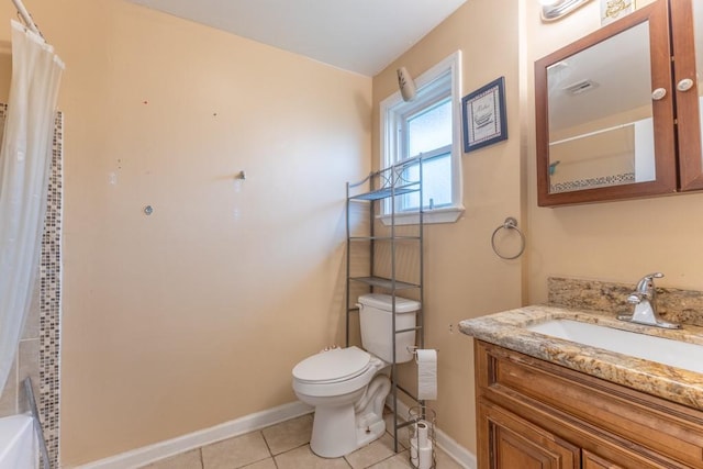 full bathroom featuring baseboards, toilet, tile patterned floors, and vanity