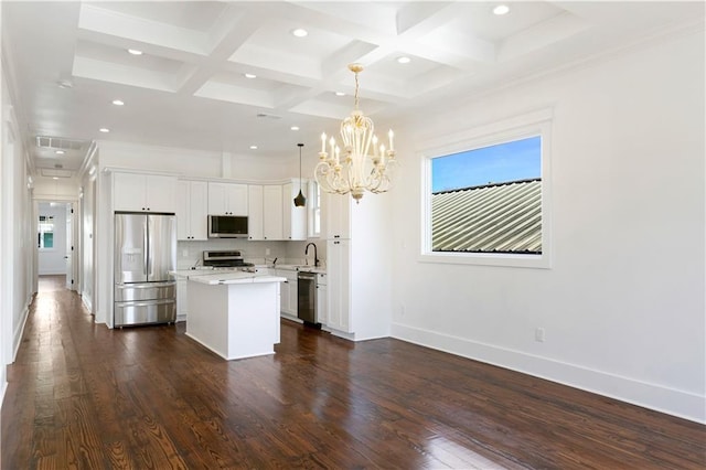 1919 N Prieur St, New Orleans, LA 70116 - kitchen featuring stainless steel appliances, a center island, a sink, light countertops, and recessed lighting