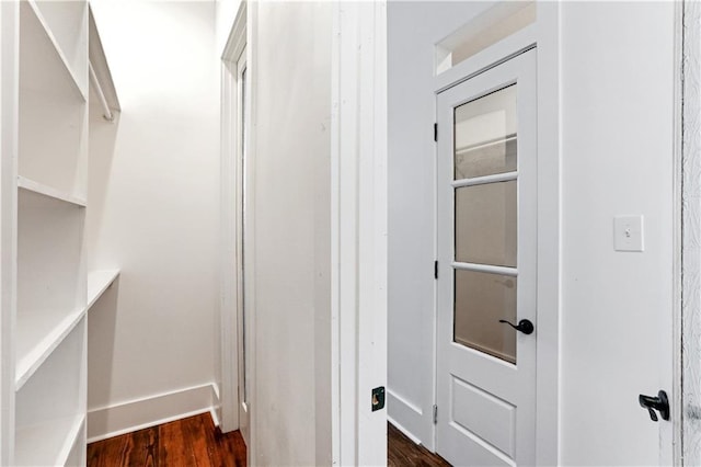 1919 N Prieur St, New Orleans, LA 70116 - walk in closet featuring dark wood-style floors
