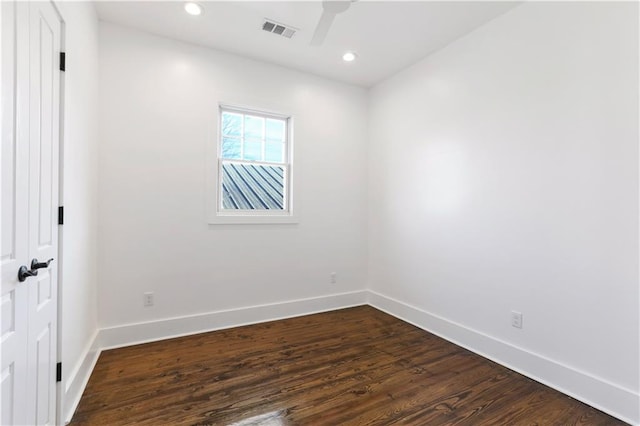 1919 N Prieur St, New Orleans, LA 70116 - spare room featuring baseboards, dark wood-style flooring, and recessed lighting