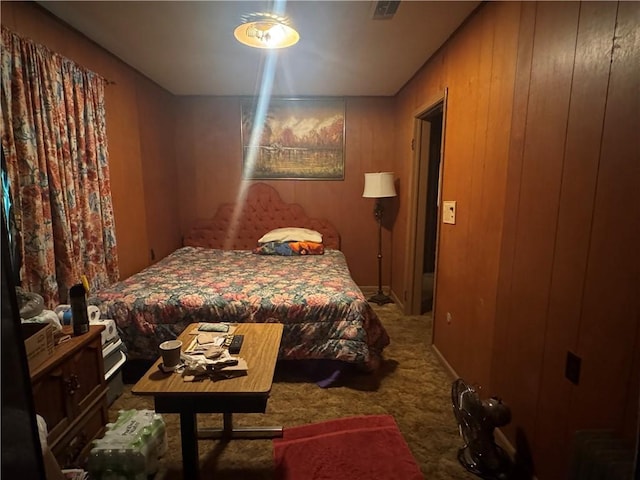 134B First St, Boutte, LA 70039 - bedroom with carpet floors and wood walls