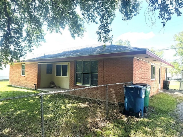 134B First St, Boutte, LA 70039 - back of house featuring brick siding