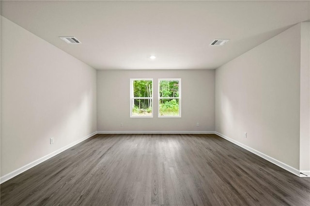 24231 Gadwall Ave, Ponchatoula, LA 70454 - unfurnished room featuring dark wood finished floors and baseboards