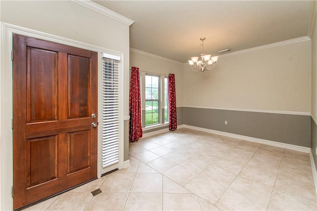 17181 Bridle Path, Hammond, LA 70403 - entryway featuring a chandelier, crown molding, light tile patterned flooring, and baseboards