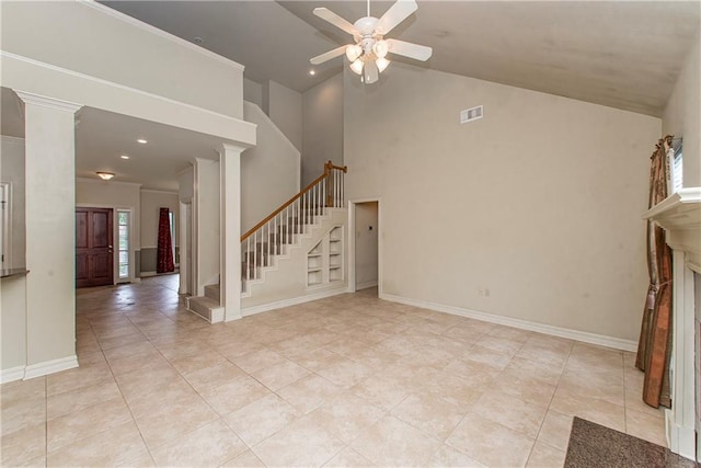 17181 Bridle Path, Hammond, LA 70403 - unfurnished living room featuring stairs, ceiling fan, light tile patterned floors, decorative columns, and high vaulted ceiling