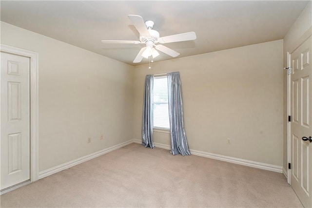 17181 Bridle Path, Hammond, LA 70403 - unfurnished bedroom with light carpet, baseboards, and a ceiling fan