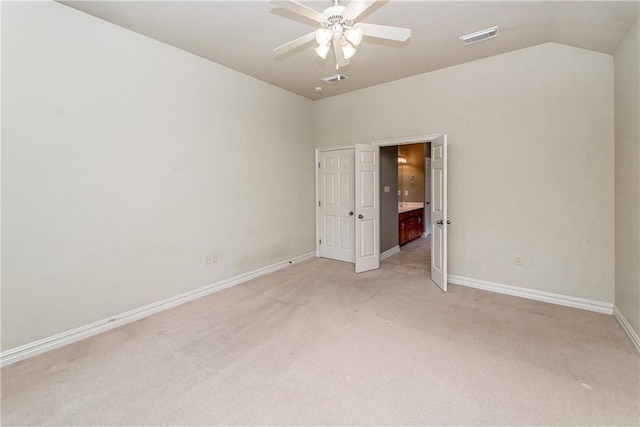 17181 Bridle Path, Hammond, LA 70403 - unfurnished bedroom featuring light colored carpet, baseboards, vaulted ceiling, and a ceiling fan