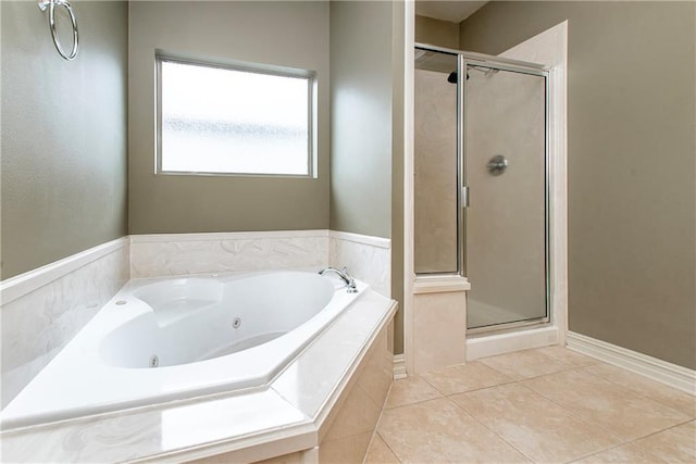 17181 Bridle Path, Hammond, LA 70403 - bathroom featuring a shower stall, a tub with jets, and tile patterned flooring