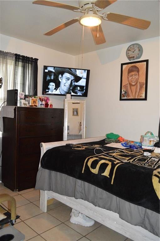 4133 Pauger St, New Orleans, LA 70122 - bedroom featuring light tile patterned floors and a ceiling fan