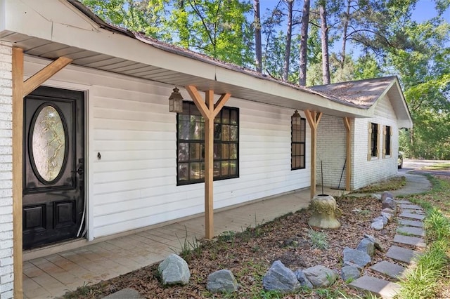 70 Hyacinth Dr, Covington, LA 70433 - view of side of property with brick siding