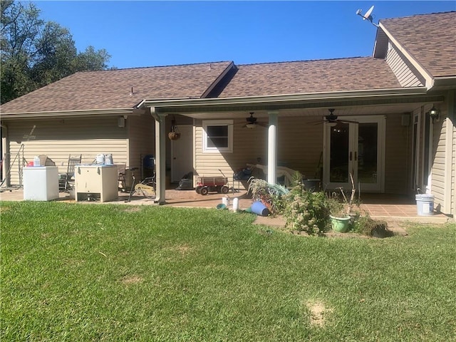 45246 Morris Rd, Hammond, LA 70401 - back of house featuring ceiling fan, a patio, a lawn, a shingled roof, and french doors