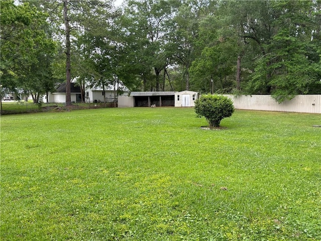 45246 Morris Rd, Hammond, LA 70401 - view of yard featuring an outbuilding and a shed