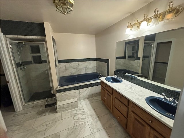 45246 Morris Rd, Hammond, LA 70401 - bathroom with marble finish flooring, a garden tub, a stall shower, and double vanity