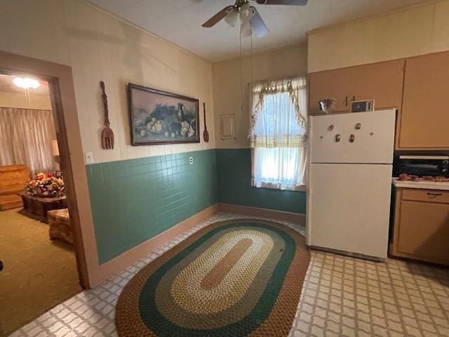 41012 S Range Rd, Ponchatoula, LA 70454 - kitchen with freestanding refrigerator, ceiling fan, and light flooring
