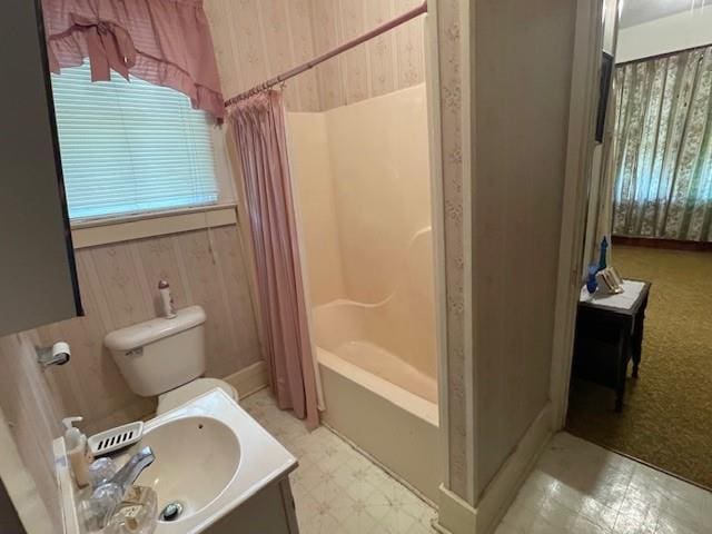 41012 S Range Rd, Ponchatoula, LA 70454 - bathroom featuring tile patterned floors, wooden walls, vanity, toilet, and shower / tub combo