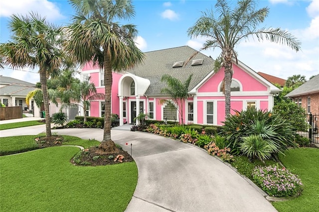3805 3rd St, Metairie, LA 70002 - view of front of house with curved driveway and stucco siding
