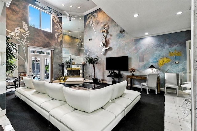 3805 3rd St, Metairie, LA 70002 - living area featuring a towering ceiling, recessed lighting, ceiling fan, and tile patterned floors