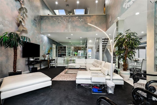 3805 3rd St, Metairie, LA 70002 - living area with a high ceiling, stairway, and recessed lighting