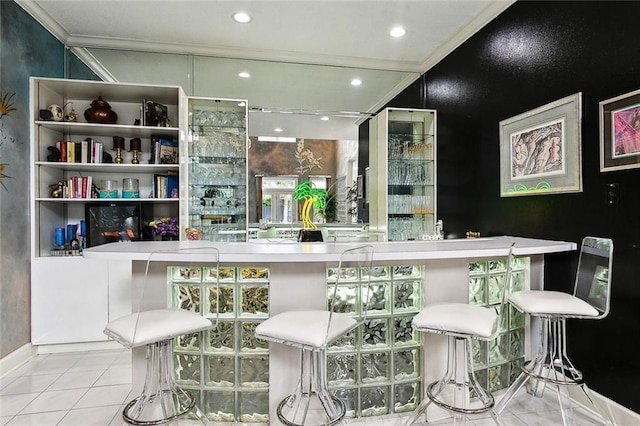 3805 3rd St, Metairie, LA 70002 - bar area with tile patterned flooring, ornamental molding, and recessed lighting