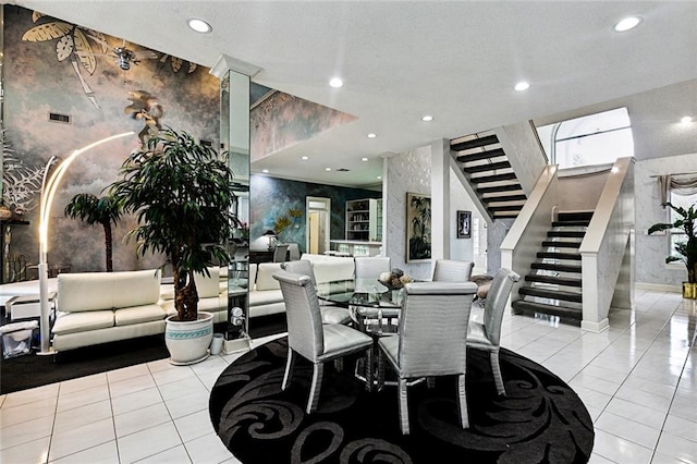 3805 3rd St, Metairie, LA 70002 - dining space featuring tile patterned flooring, stairs, recessed lighting, and stone wall