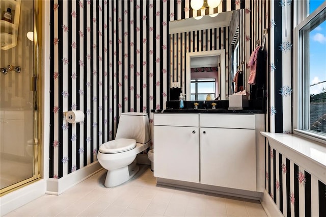3805 3rd St, Metairie, LA 70002 - bathroom featuring wallpapered walls, baseboards, toilet, a stall shower, and vanity