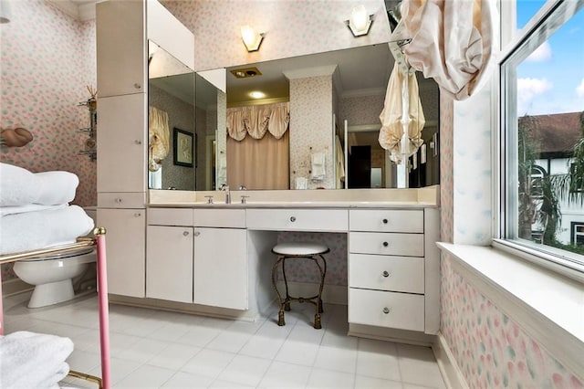 3805 3rd St, Metairie, LA 70002 - full bath featuring wallpapered walls, plenty of natural light, toilet, vanity, and ornamental molding