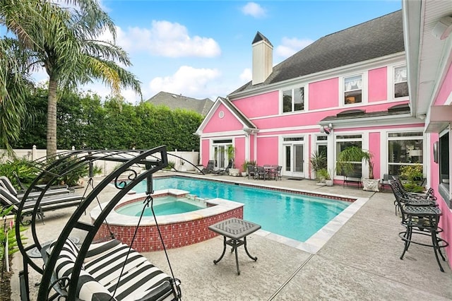 3805 3rd St, Metairie, LA 70002 - view of pool with a patio area, french doors, and a pool with connected hot tub