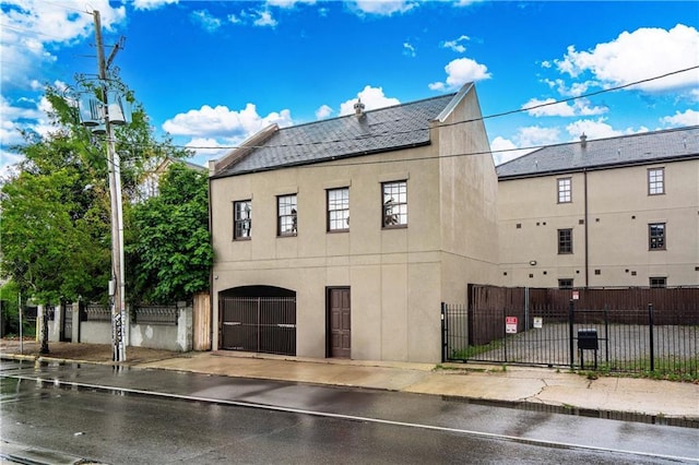 view of property with a fenced front yard