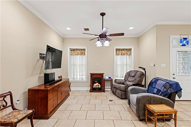 5805 Argonne Blvd, New Orleans, LA 70124 - living area featuring a ceiling fan, light tile patterned flooring, ornamental molding, recessed lighting, and a warm lit fireplace
