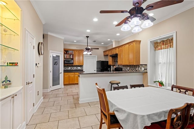 5805 Argonne Blvd, New Orleans, LA 70124 - dining space featuring ceiling fan, recessed lighting, light tile patterned floors, and ornamental molding