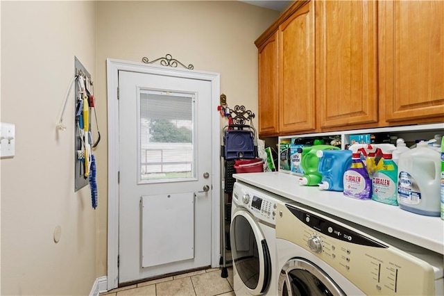 5805 Argonne Blvd, New Orleans, LA 70124 - clothes washing area with cabinet space, washing machine and dryer, and light tile patterned floors