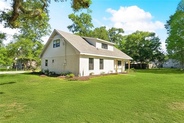 2004 Bluebird St, Slidell, LA 70460 - view of property exterior with a yard and brick siding