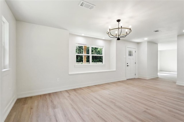 2004 Bluebird St, Slidell, LA 70460 - entrance foyer with a chandelier, light wood-style flooring, baseboards, and recessed lighting