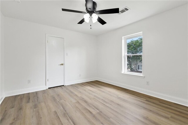 27 Yellowstone Dr, New Orleans, LA 70131 - spare room featuring wood finished floors, baseboards, and ceiling fan