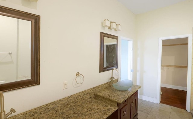 5106 Baccich St, New Orleans, LA 70122 - bathroom featuring vanity and tile patterned floors