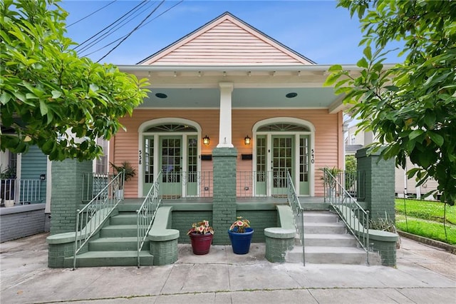 property entrance featuring a porch