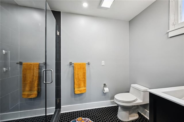 full bath featuring baseboards, a stall shower, toilet, recessed lighting, and tile patterned floors