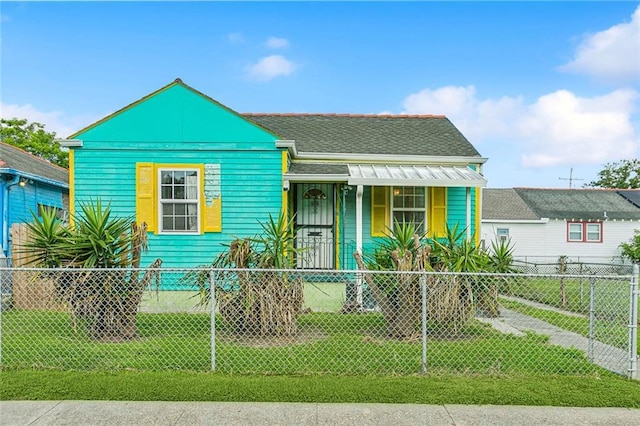 930 Andry St, New Orleans, LA 70117 - bungalow-style home featuring a porch and roof with shingles