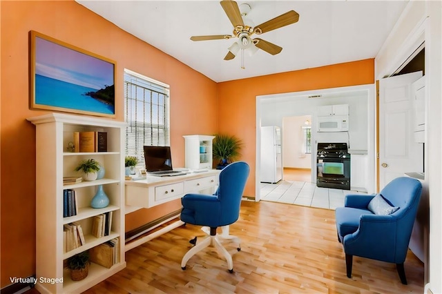 930 Andry St, New Orleans, LA 70117 - office featuring ceiling fan, light wood-type flooring, and healthy amount of natural light