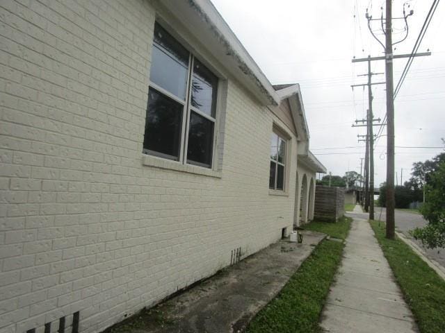 4701 Marais St, New Orleans, LA 70117 - view of side of property with brick siding