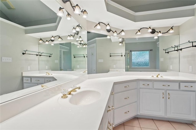 1306 Woodmere Dr, Mandeville, LA 70471 - bathroom with crown molding, tile patterned flooring, and double vanity