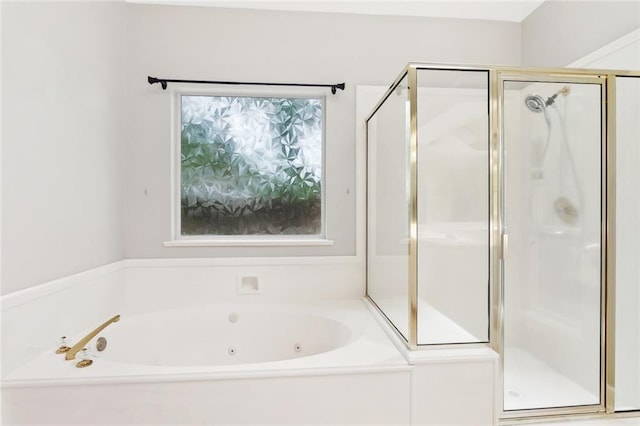 1306 Woodmere Dr, Mandeville, LA 70471 - bathroom featuring a shower stall and a jetted tub