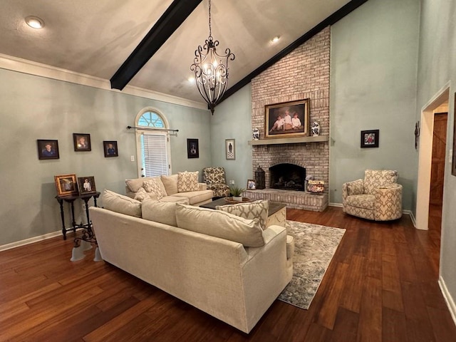 208 Noble Dr, Brookhaven, MS 39601 - living area featuring a chandelier, a fireplace, dark wood finished floors, baseboards, and crown molding