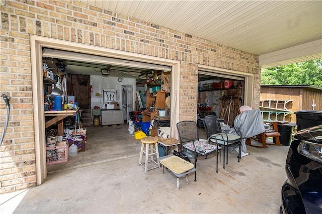 view of patio featuring a garage