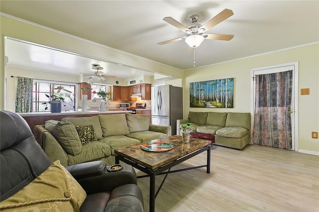 609 N Starrett Rd, Metairie, LA 70003 - living room featuring a ceiling fan, light wood-type flooring, and crown molding